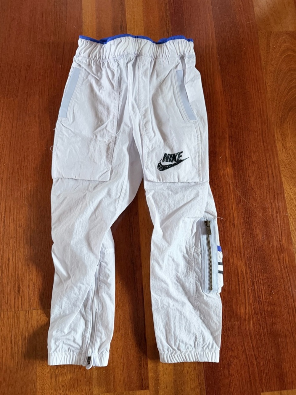 Nike White Kids Sweatpants with Blue Trim